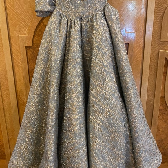 Blue $990
STYLE 2466
Gorgeous elegant dress received many compliment - Picture 8 of 16